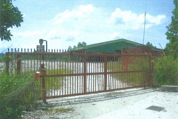 Detached factory sited on a parcel of land